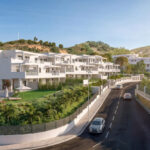 Vista exterior de la promoción de obra nueva Vía Célere Victoria I con edificios residenciales de diseño moderno, piscina comunitaria, amplias zonas ajardinadas y viviendas con grandes terrazas.
