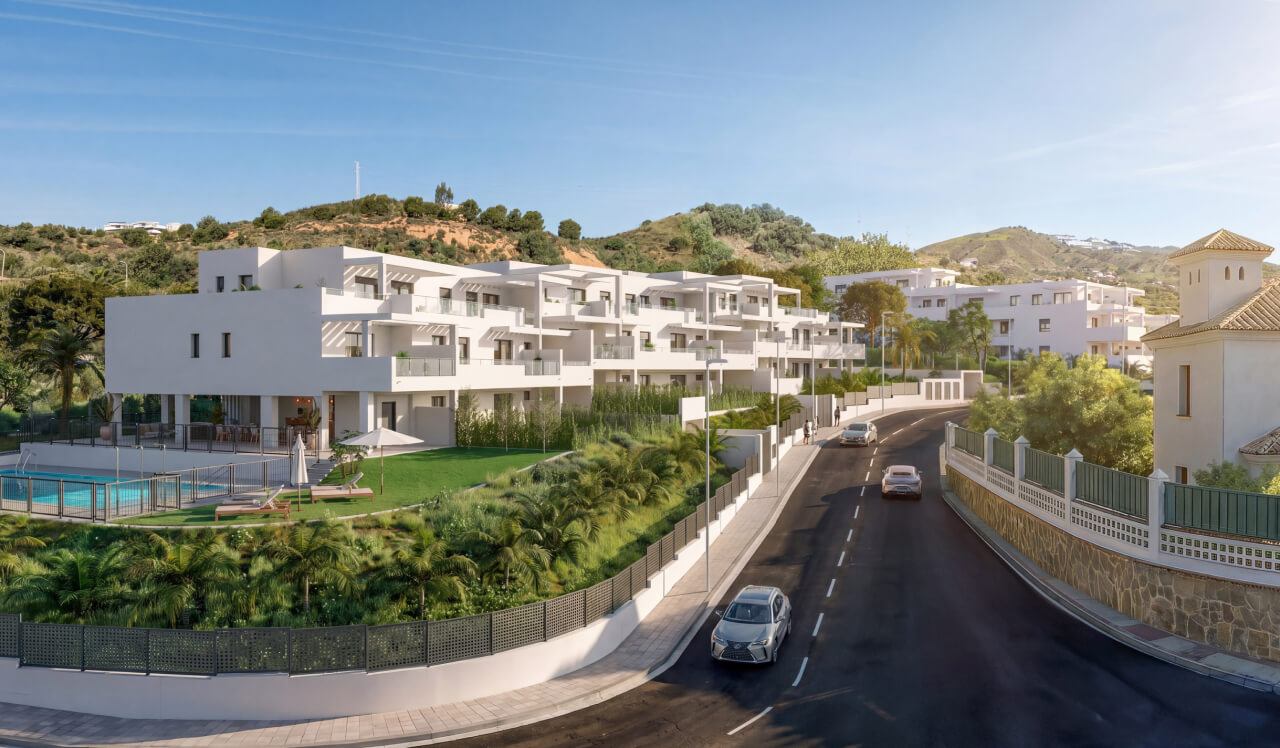 Vista exterior de la promoción de obra nueva Vía Célere Victoria I con edificios residenciales de diseño moderno, piscina comunitaria, amplias zonas ajardinadas y viviendas con grandes terrazas.