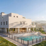 Zonas comunes de la promoción de obra nueva Vía Célere Victoria I con piscina exterior, amplias áreas ajardinadas y arquitectura moderna.