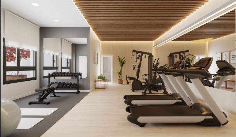 La imagen muestra el gimnasio comunitario del complejo residencial de obra nueva Célere Blossom Hills, ubicado en Benalmádena, Málaga.
